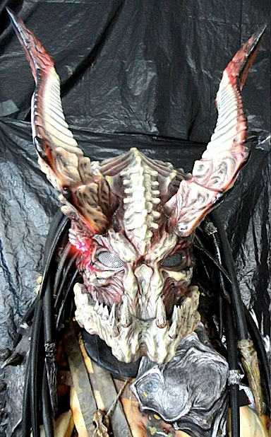 Illustration for article titled This insane homemade Predator mask is perfect for dinner parties